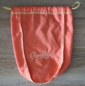 Orange and gold crown royal dust bag